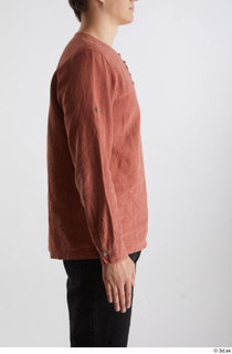 Brett  1 casual dressed orange linen shirt side view…